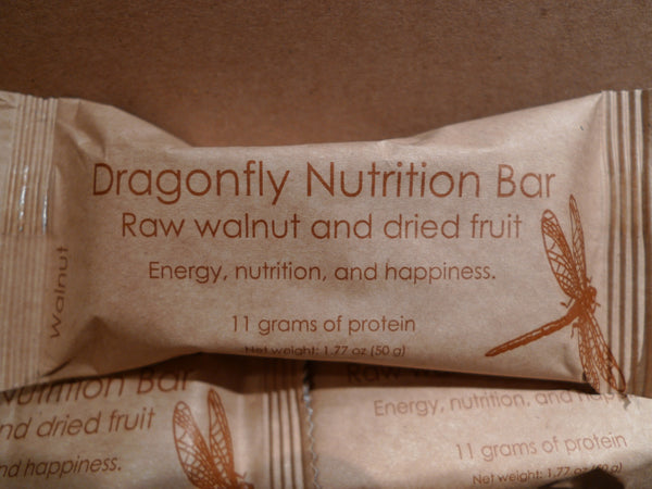 Walnut, organic coconut, and organic dried fruit nutrition bar